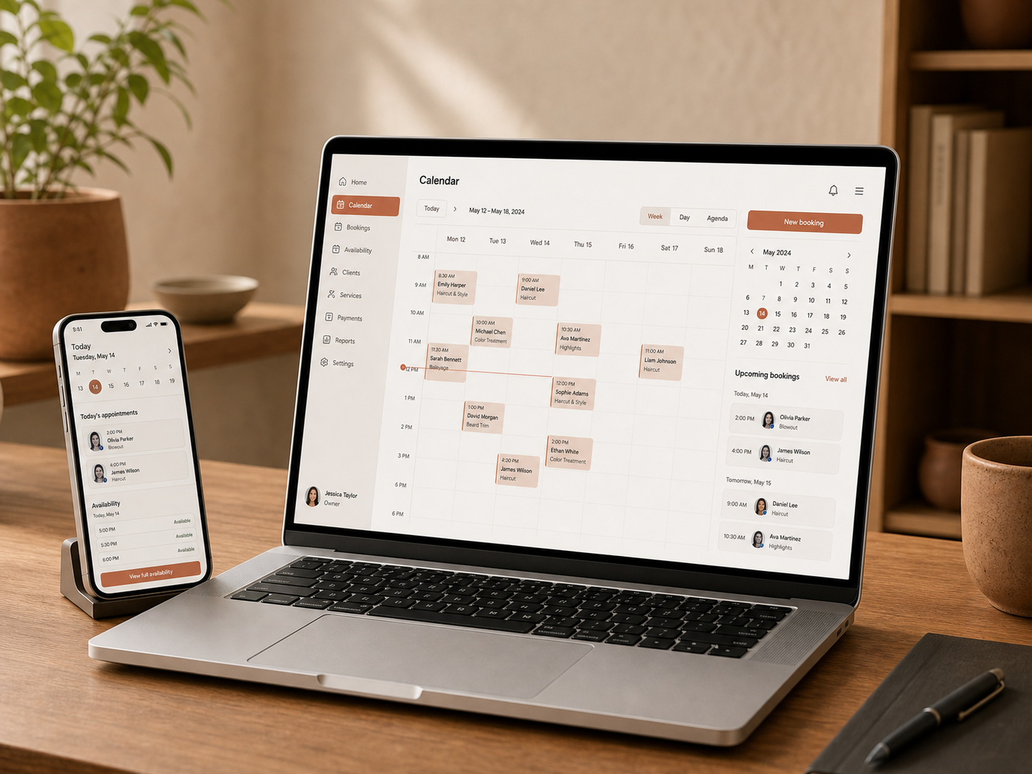 Booking calendar software shown on a laptop with an appointment app on a phone